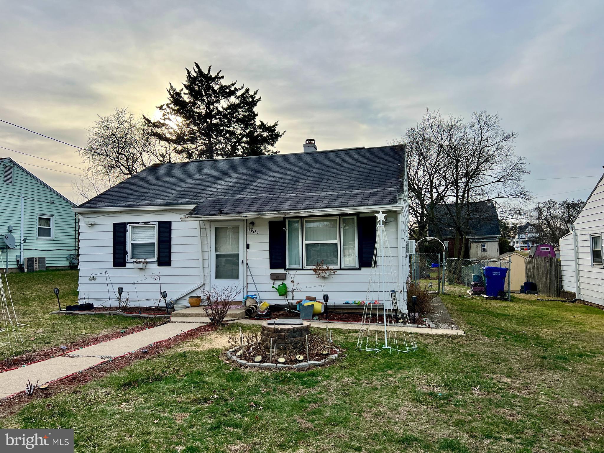 3905 Rauch Street Harrisburg, PA 17109 - Photo 2 of 5 a view of a house with backyard sitting area and garden