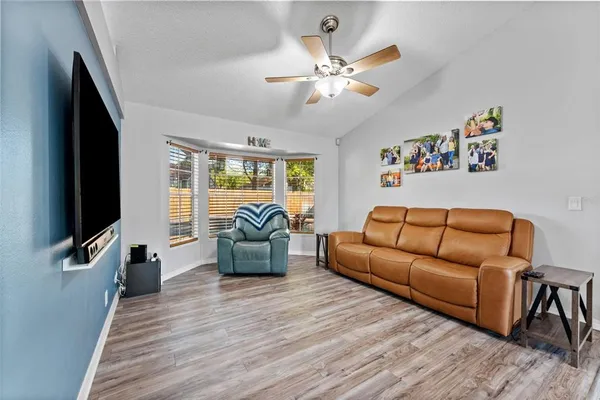 a view of a hallway with windows