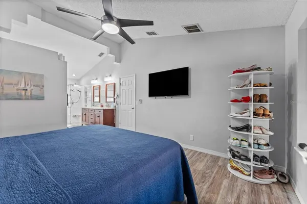 a view of a bathroom with a tub and window