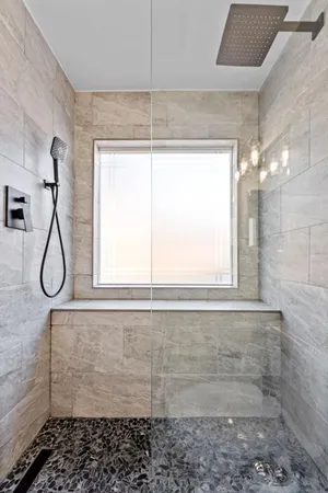 a utility room with washing machine