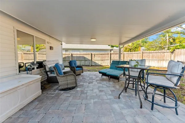 a view of a swimming pool with a sitting space