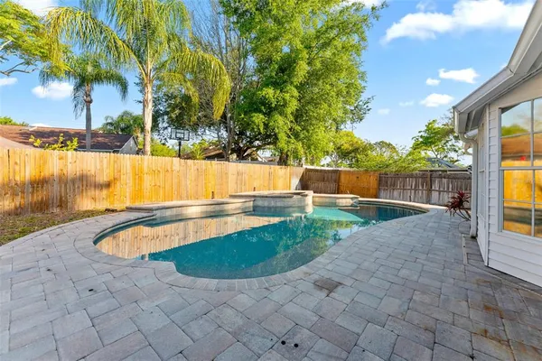 a view of backyard with outdoor space