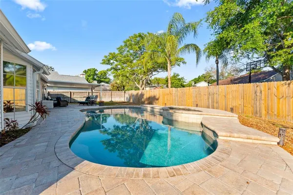 a view of a house with a swimming pool