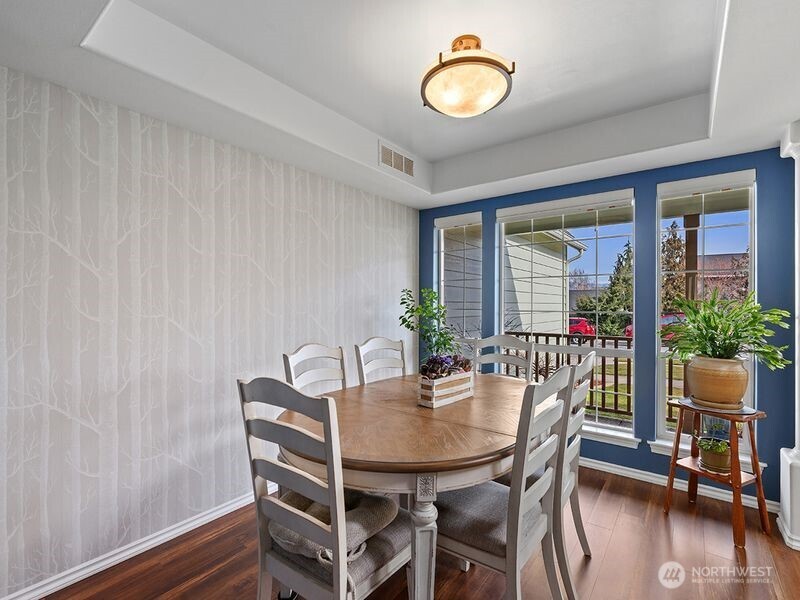 1504 Fuller Street Wenatchee, WA 98801 - Photo 18 of 38 a view of a dining room with furniture window and wooden floor