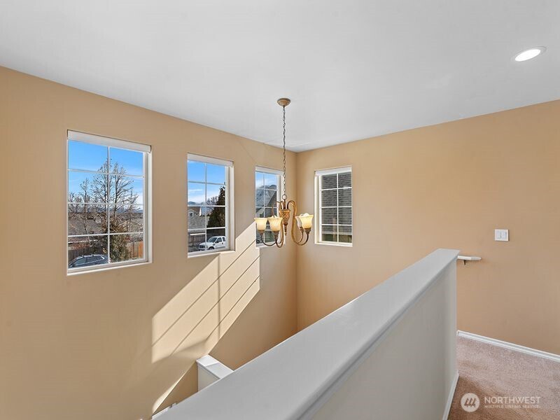 1504 Fuller Street Wenatchee, WA 98801 - Photo 22 of 38 a view of a livingroom with furniture wooden floor and windows