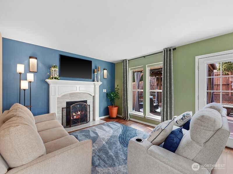 1504 Fuller Street Wenatchee, WA 98801 - Photo 6 of 38 a living room with furniture mirror and a fireplace