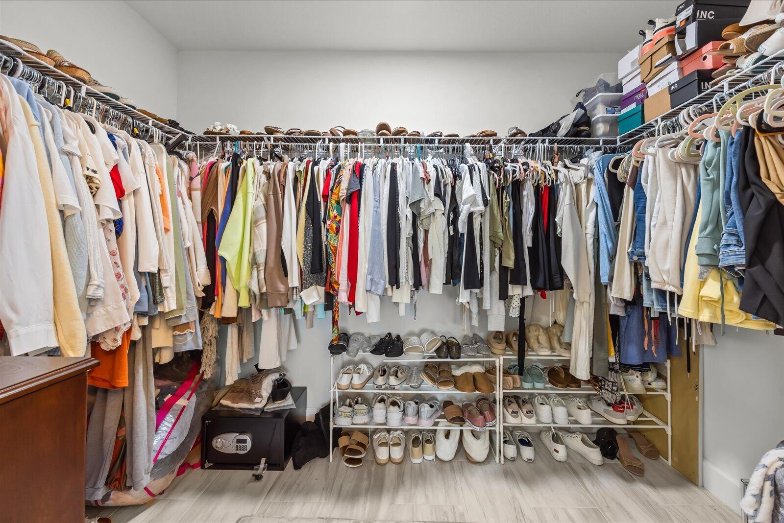 8607 Southwest 7th Lane Okeechobee, FL 34974 - Photo 23 of 44 a view of walk in closet with clothes