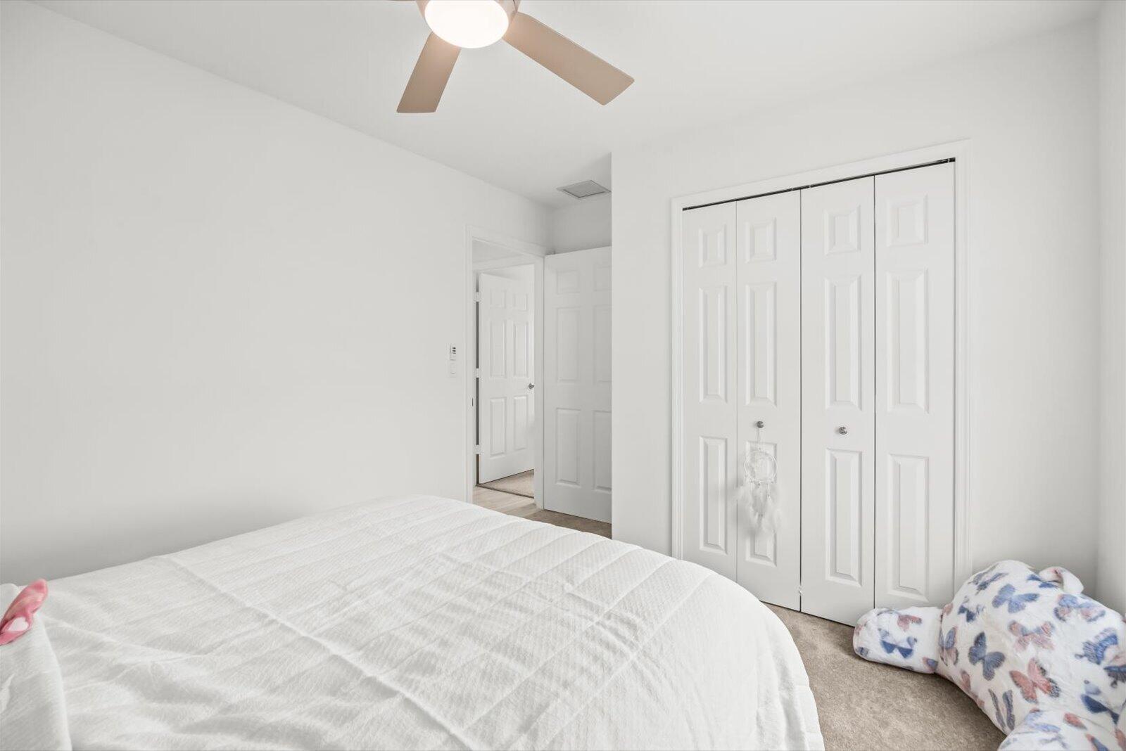 8607 Southwest 7th Lane Okeechobee, FL 34974 - Photo 28 of 44 a bedroom with a bed and a window