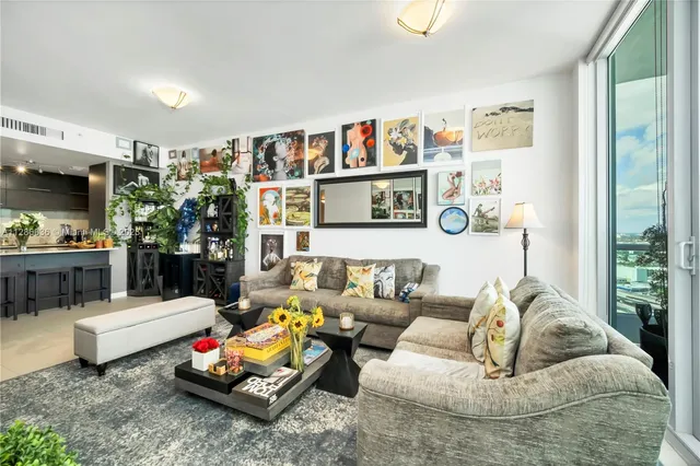 a living room with furniture and a couch