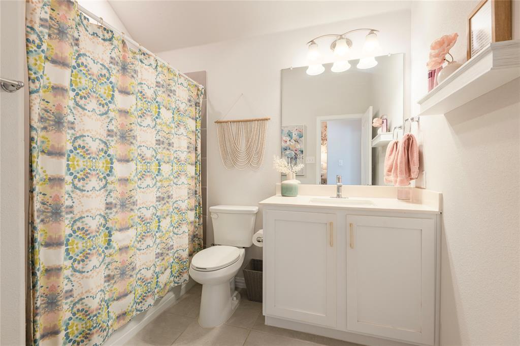 1229 Sunbeam Cove Anna, TX 75409 - Photo 27 of 36 Bathroom between two front bedrooms