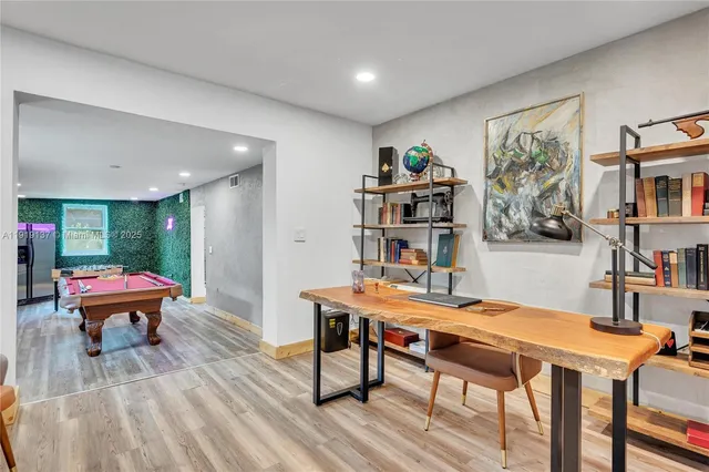 a living room with furniture and a table