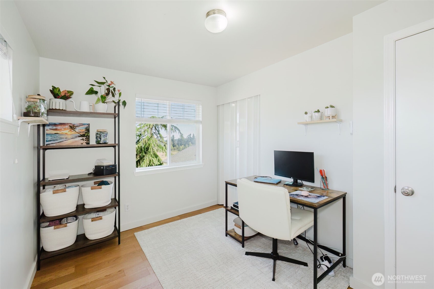 131 Alpine Loop Sequim, WA 98382 - Photo 11 of 19 a view of a workspace with furniture and wooden floor