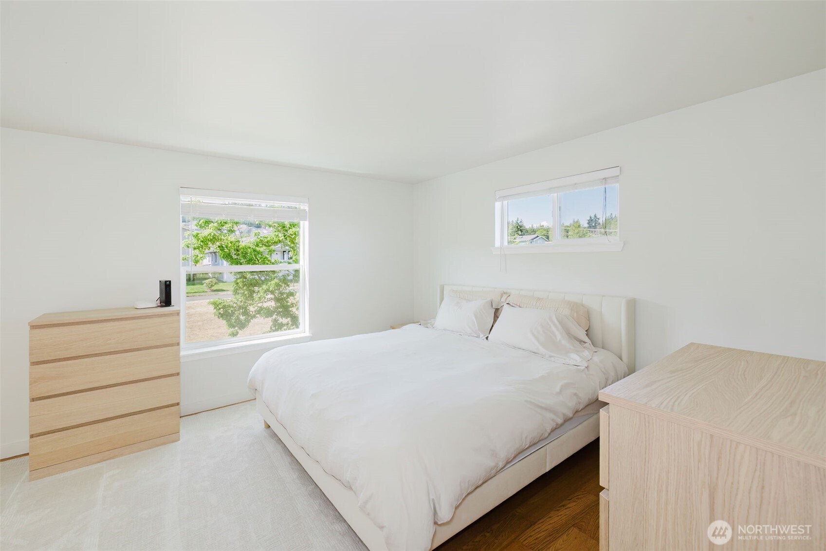 131 Alpine Loop Sequim, WA 98382 - Photo 14 of 19 a bedroom with a bed and a window