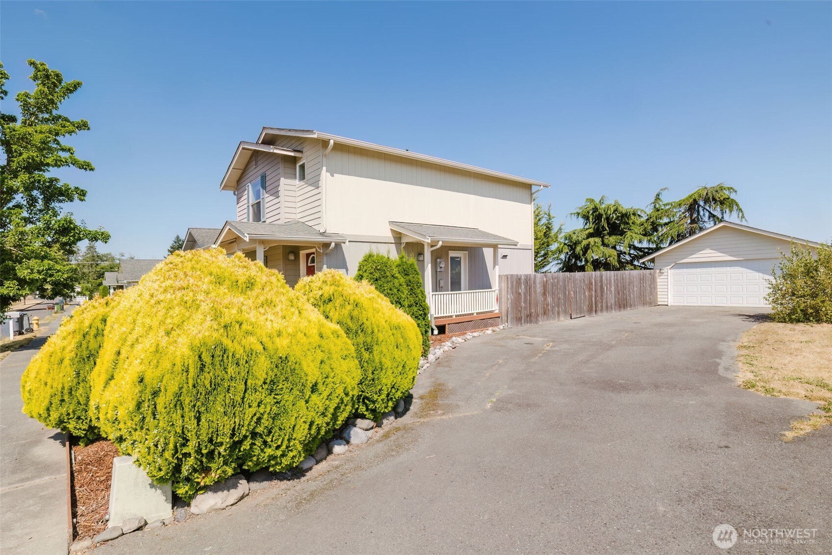 131 Alpine Loop Sequim, WA 98382 - Photo 2 of 19 a view of a backyard with a garden and plants