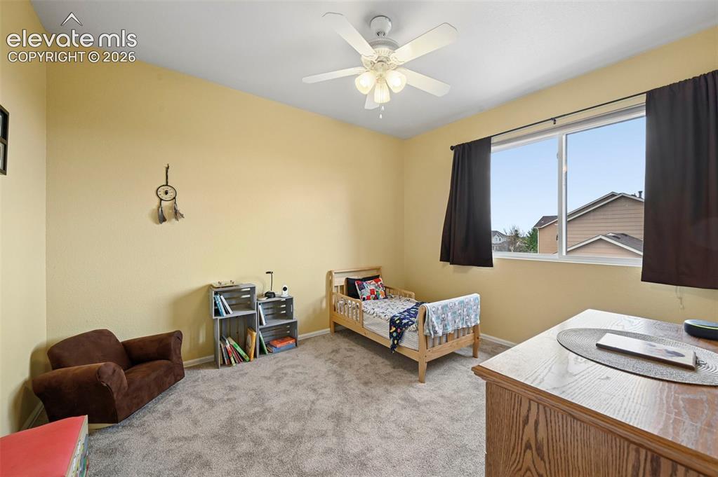12571 Scamper Road Peyton, CO 80831 - Photo 26 of 49 Upstairs bedroom 2-with walk in closet