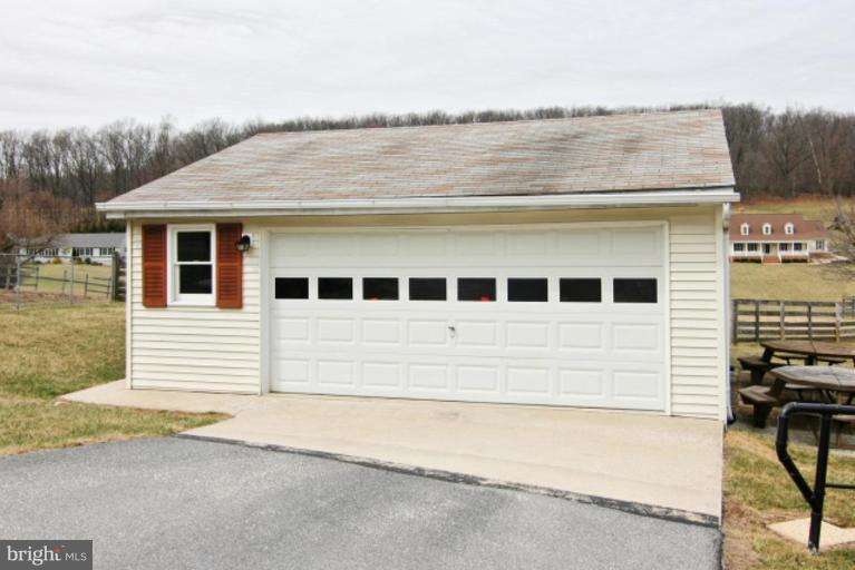 4815 Buffalo Road Mount Airy, MD 21771 - Photo 2 of 19 a front view of a house with a yard