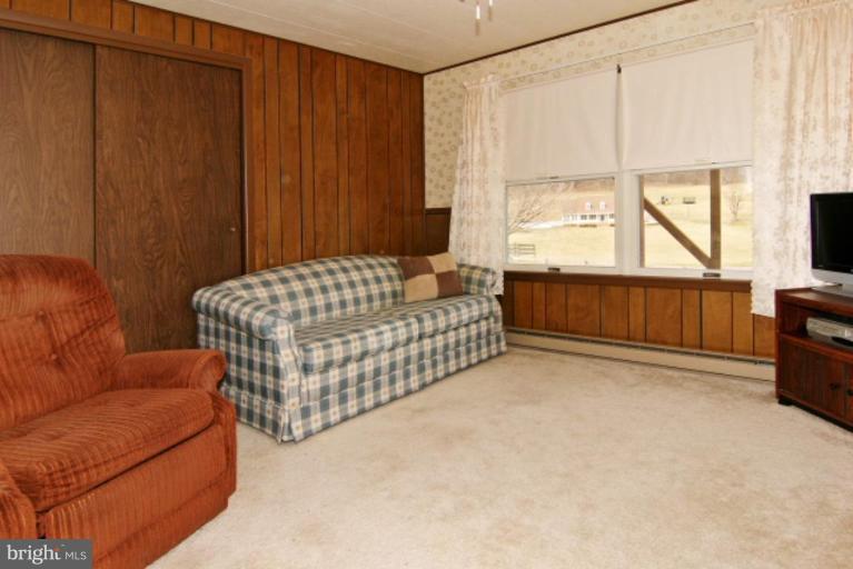 4815 Buffalo Road Mount Airy, MD 21771 - Photo 14 of 19 a bedroom with furniture and a large window
