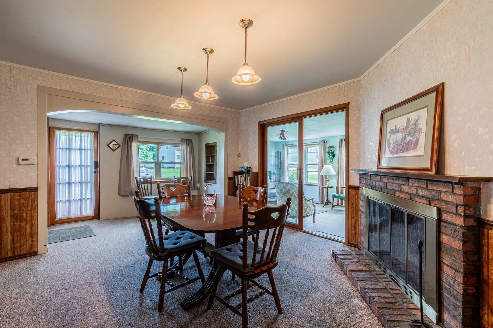 421 South Reed Street Sheffield, IL 61361 - Photo 11 of 28 a view of a dining room with furniture window and wooden floor