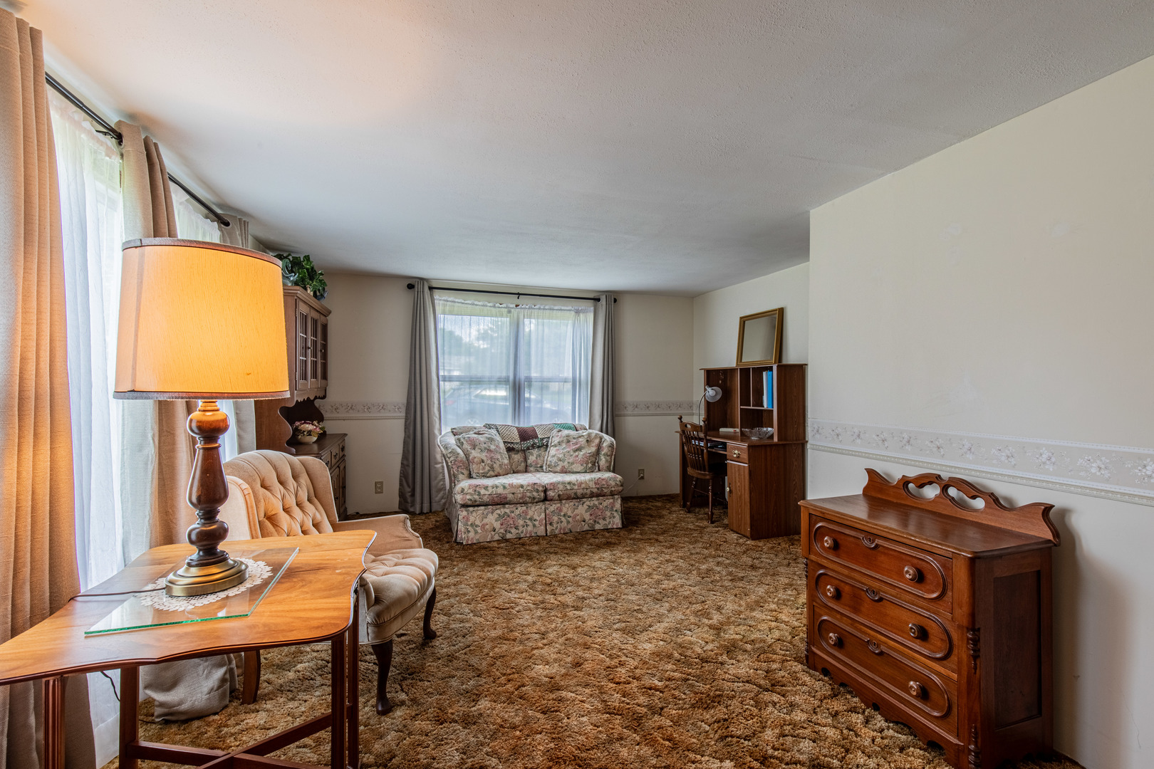421 South Reed Street Sheffield, IL 61361 - Photo 14 of 28 a bedroom with furniture and a wooden floor