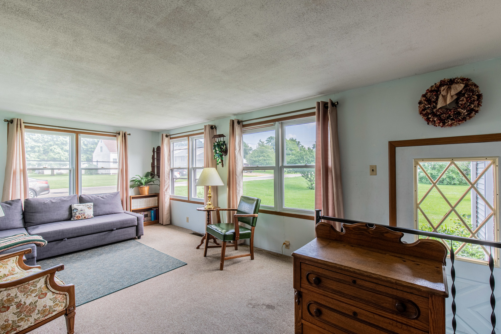 421 South Reed Street Sheffield, IL 61361 - Photo 15 of 28 a living room with furniture and a floor to ceiling window