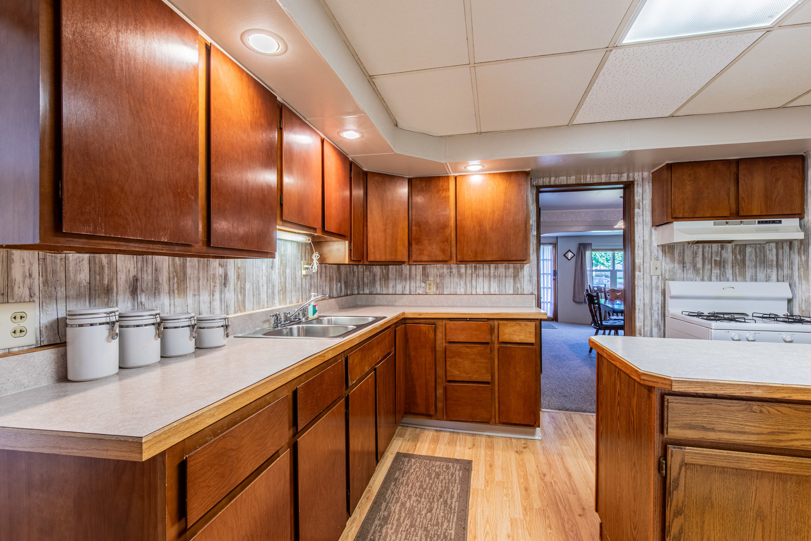 421 South Reed Street Sheffield, IL 61361 - Photo 18 of 28 a kitchen with stainless steel appliances a sink dishwasher stove and cabinets
