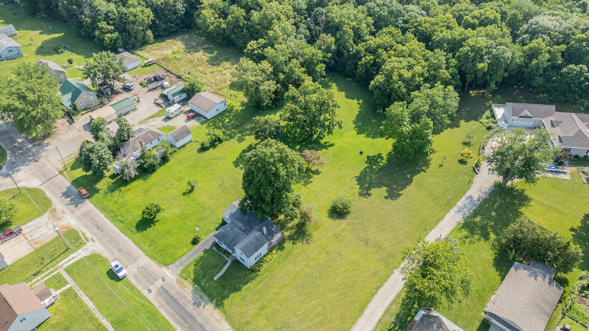 421 South Reed Street Sheffield, IL 61361 - Photo 2 of 28 an aerial view of a residential houses with outdoor space