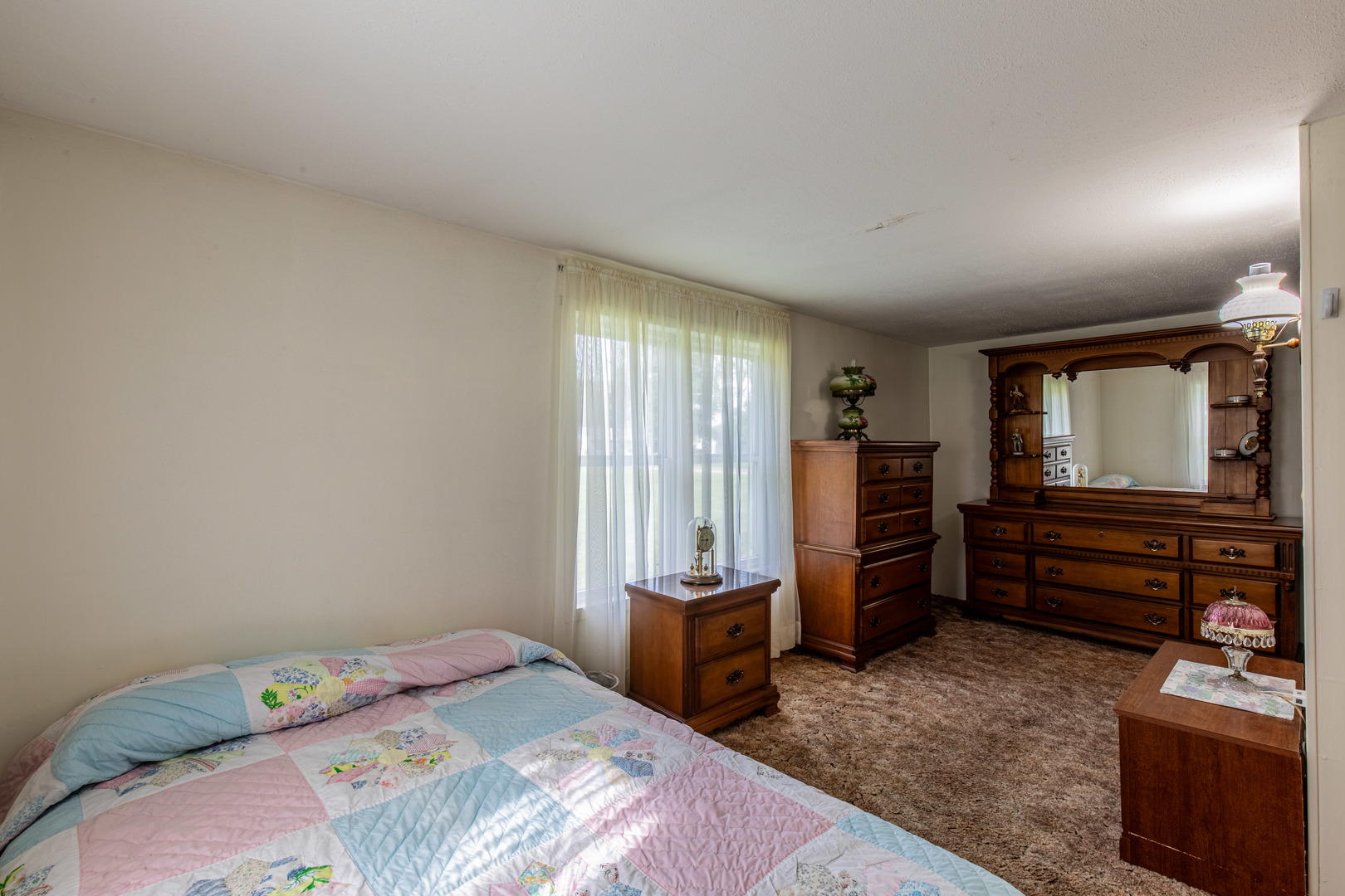 421 South Reed Street Sheffield, IL 61361 - Photo 23 of 28 a bedroom with a bed and furniture