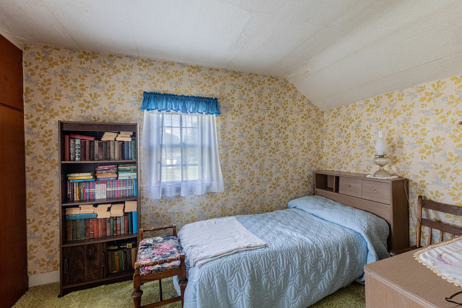 421 South Reed Street Sheffield, IL 61361 - Photo 25 of 28 a bedroom with a bed furniture and a book shelf