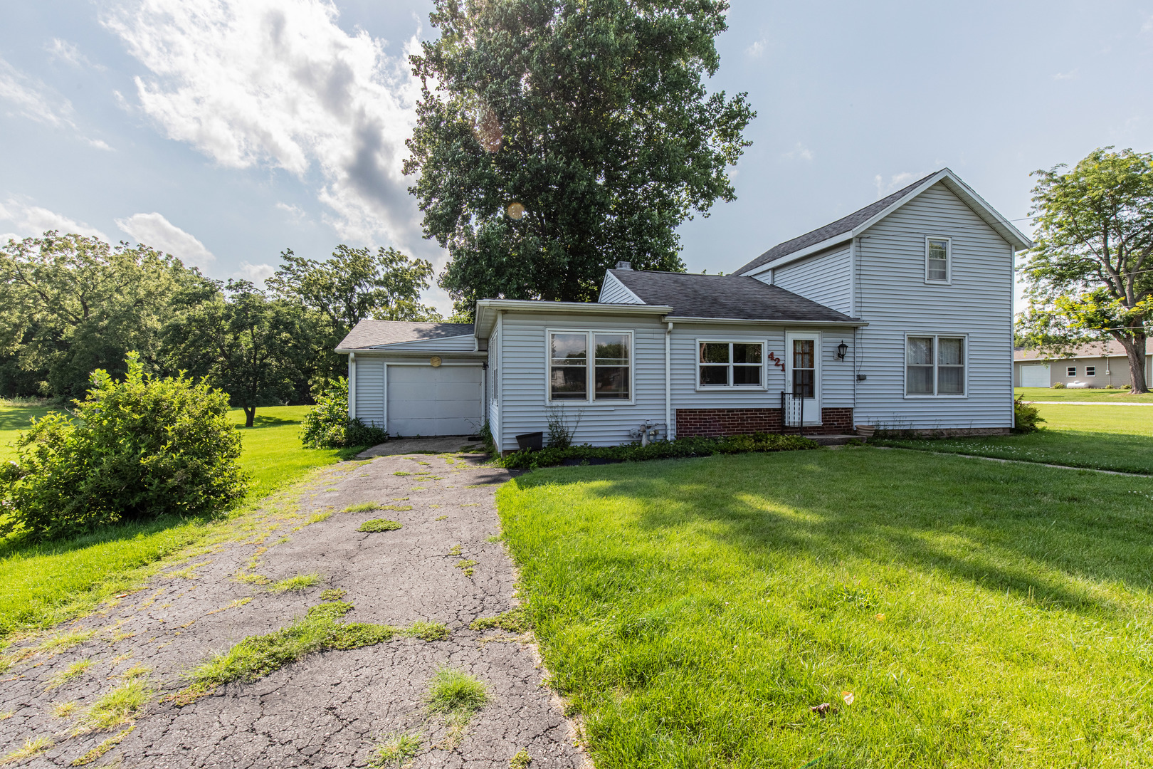 421 South Reed Street Sheffield, IL 61361 - Photo 26 of 28 a view of a yard in front of house