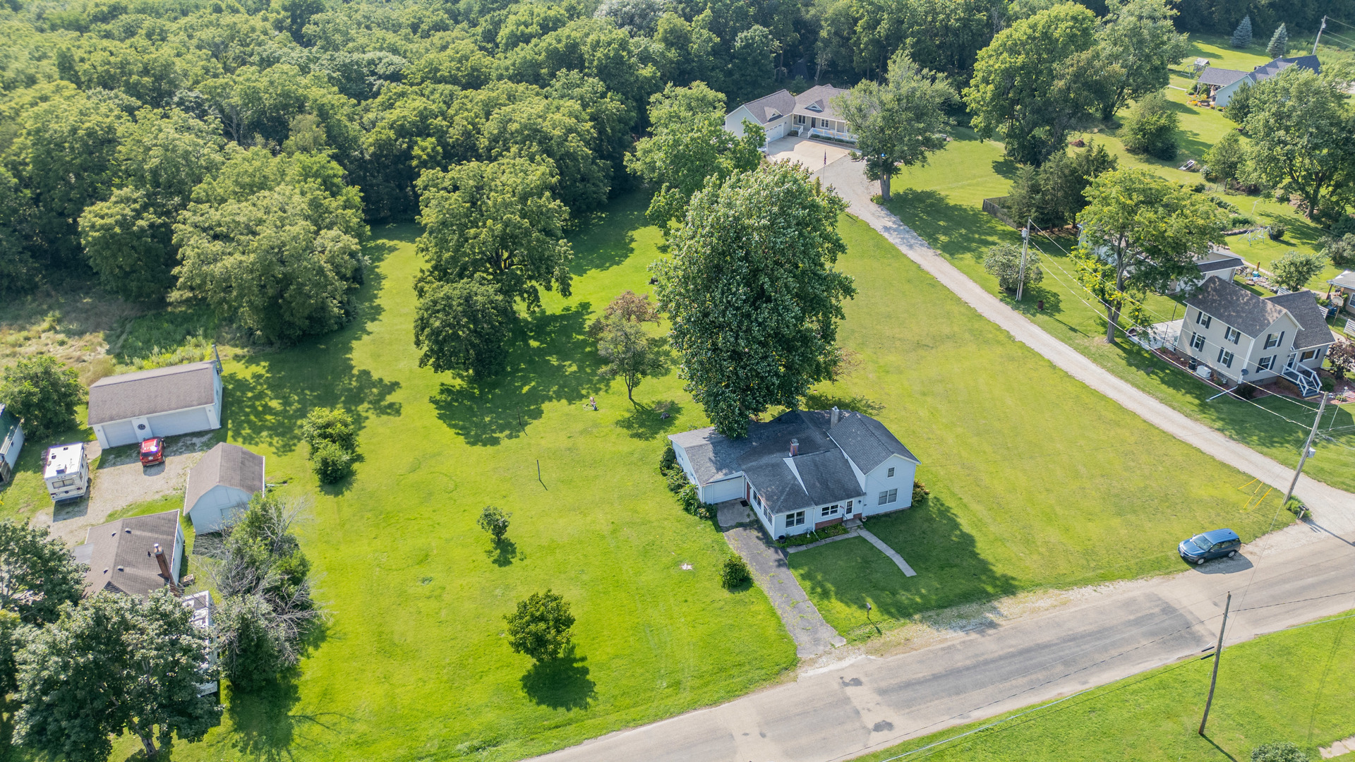 421 South Reed Street Sheffield, IL 61361 - Photo 3 of 28 an aerial view of a residential houses with outdoor space