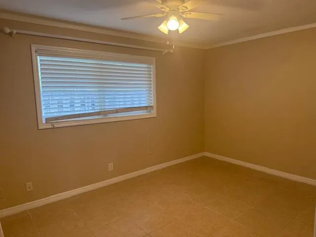 a view of a room that has a window in it