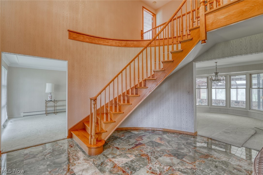 5216 Powder Mill Road Kent, OH 44240 - Photo 4 of 18 Foyer curved staircase w/onyx floor
