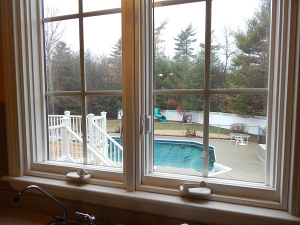 12 Azel Road Freetown, MA 02717 - Photo 11 of 30 a view of a glass door with a tree