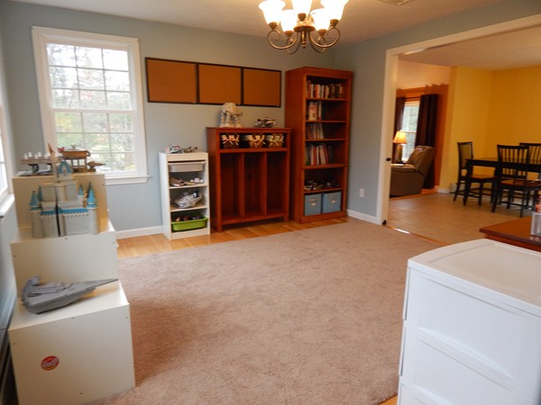 12 Azel Road Freetown, MA 02717 - Photo 14 of 30 a living room with furniture and a flat screen tv