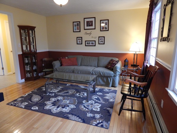 12 Azel Road Freetown, MA 02717 - Photo 15 of 30 a living room with furniture rug and wooden floor