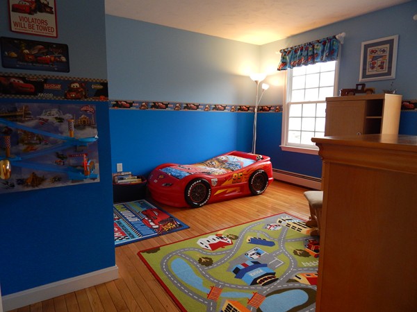 12 Azel Road Freetown, MA 02717 - Photo 22 of 30 a bedroom with two beds and a bookshelf
