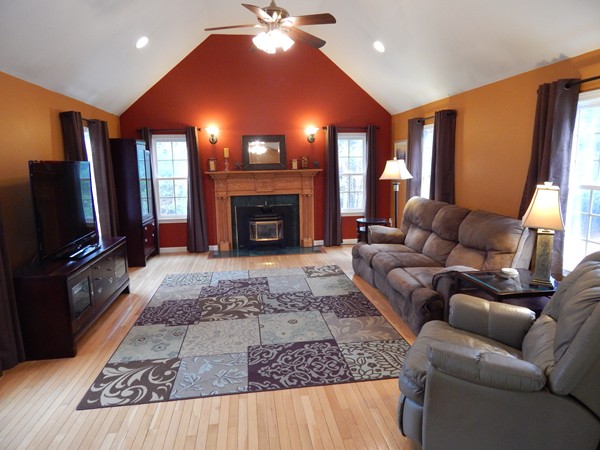 12 Azel Road Freetown, MA 02717 - Photo 5 of 30 a living room with furniture and a fireplace
