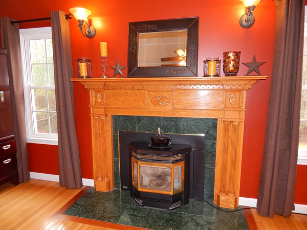 12 Azel Road Freetown, MA 02717 - Photo 6 of 30 a room with fireplace and a chair