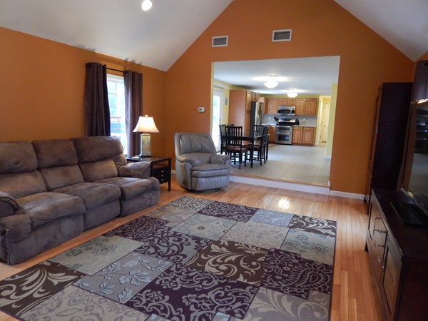 12 Azel Road Freetown, MA 02717 - Photo 7 of 30 a living room with furniture and a flat screen tv