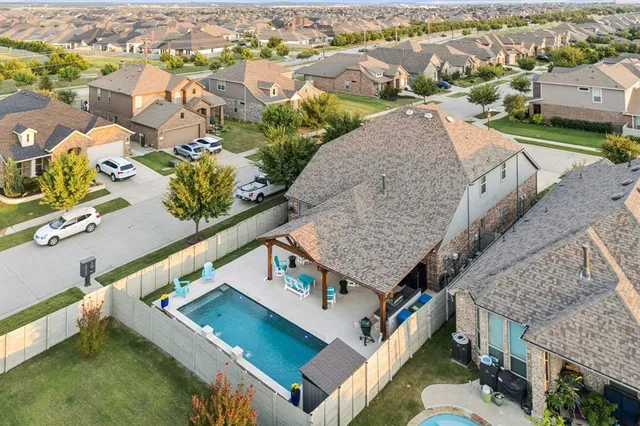 an aerial view of a house with a garden