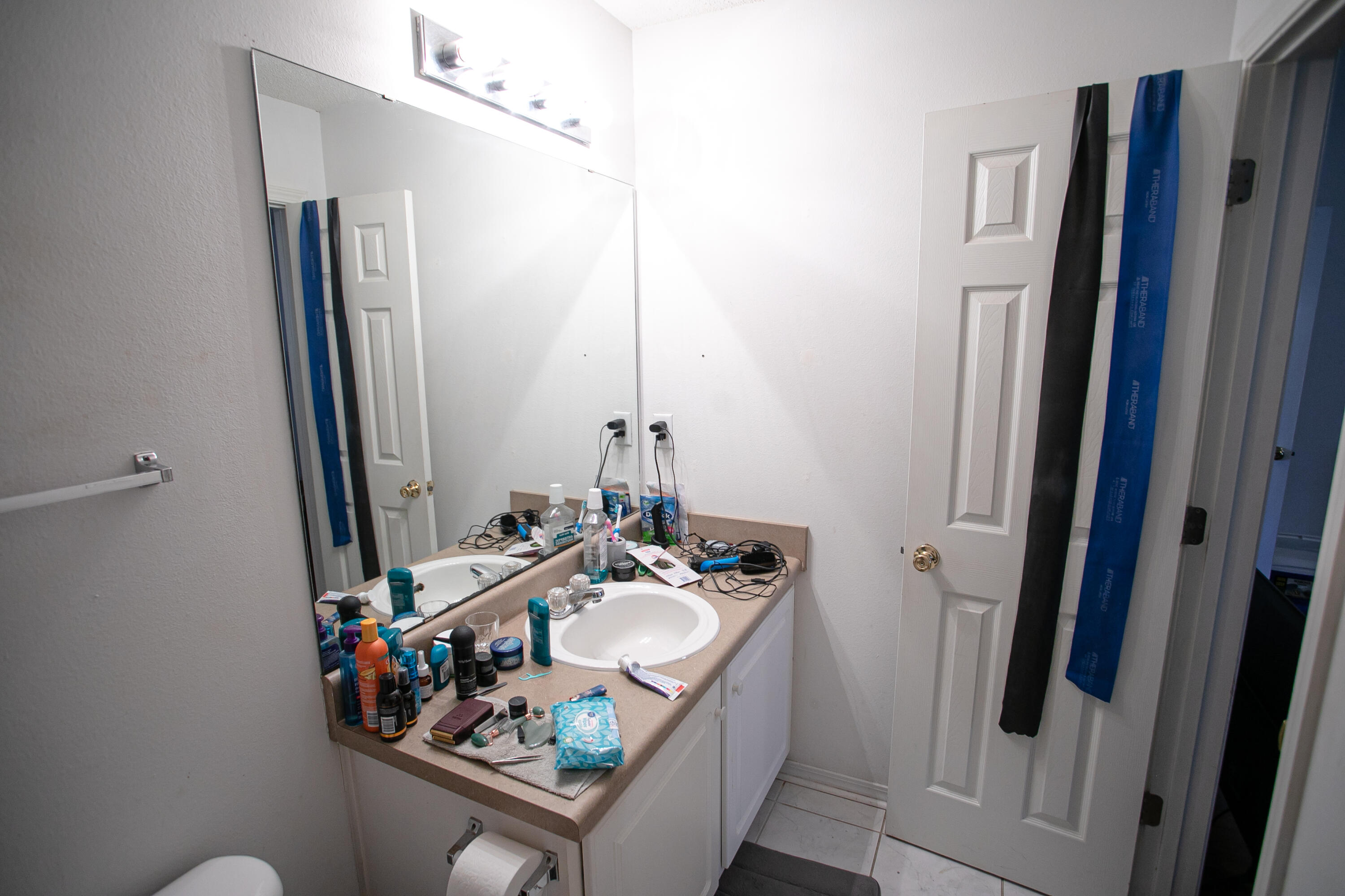 507 Keystone Road Mary Esther, FL 32569 - Photo 21 of 30 a bathroom with a sink vanity and mirror