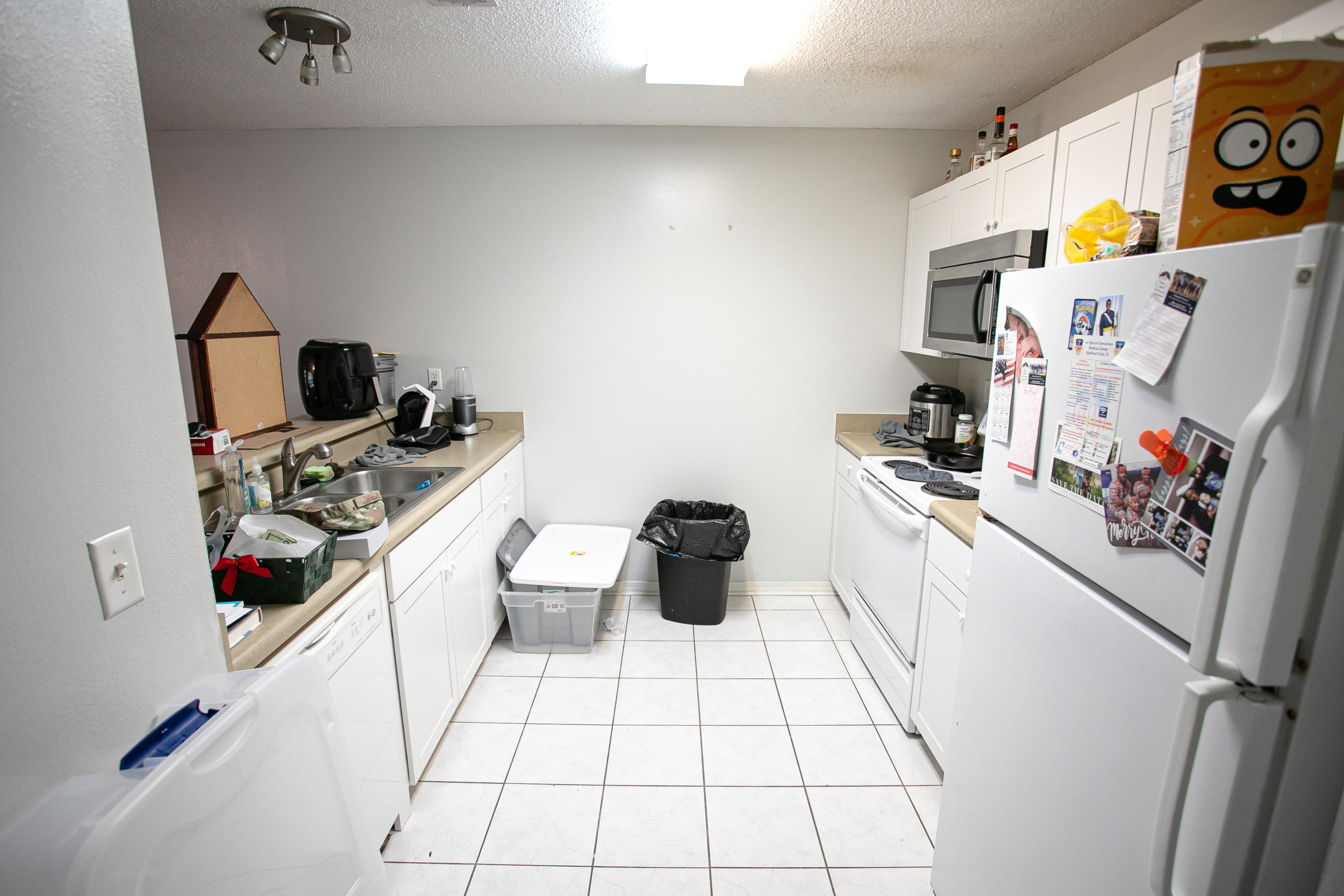 507 Keystone Road Mary Esther, FL 32569 - Photo 6 of 30 a kitchen with a sink appliances and cabinets