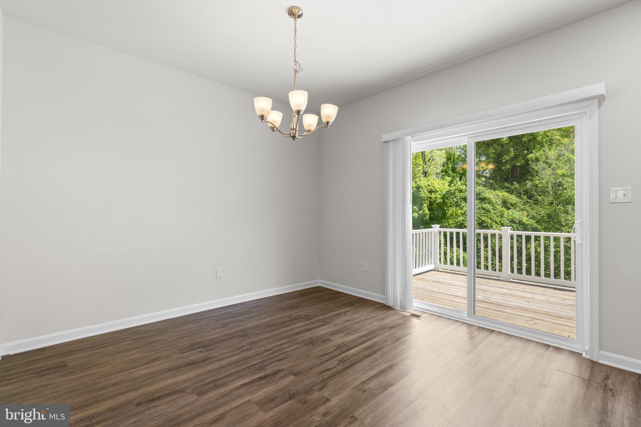 7980 Patterson Way Hanover, MD 21076 - Photo 17 of 45 Dining Area with Sliders to Deck