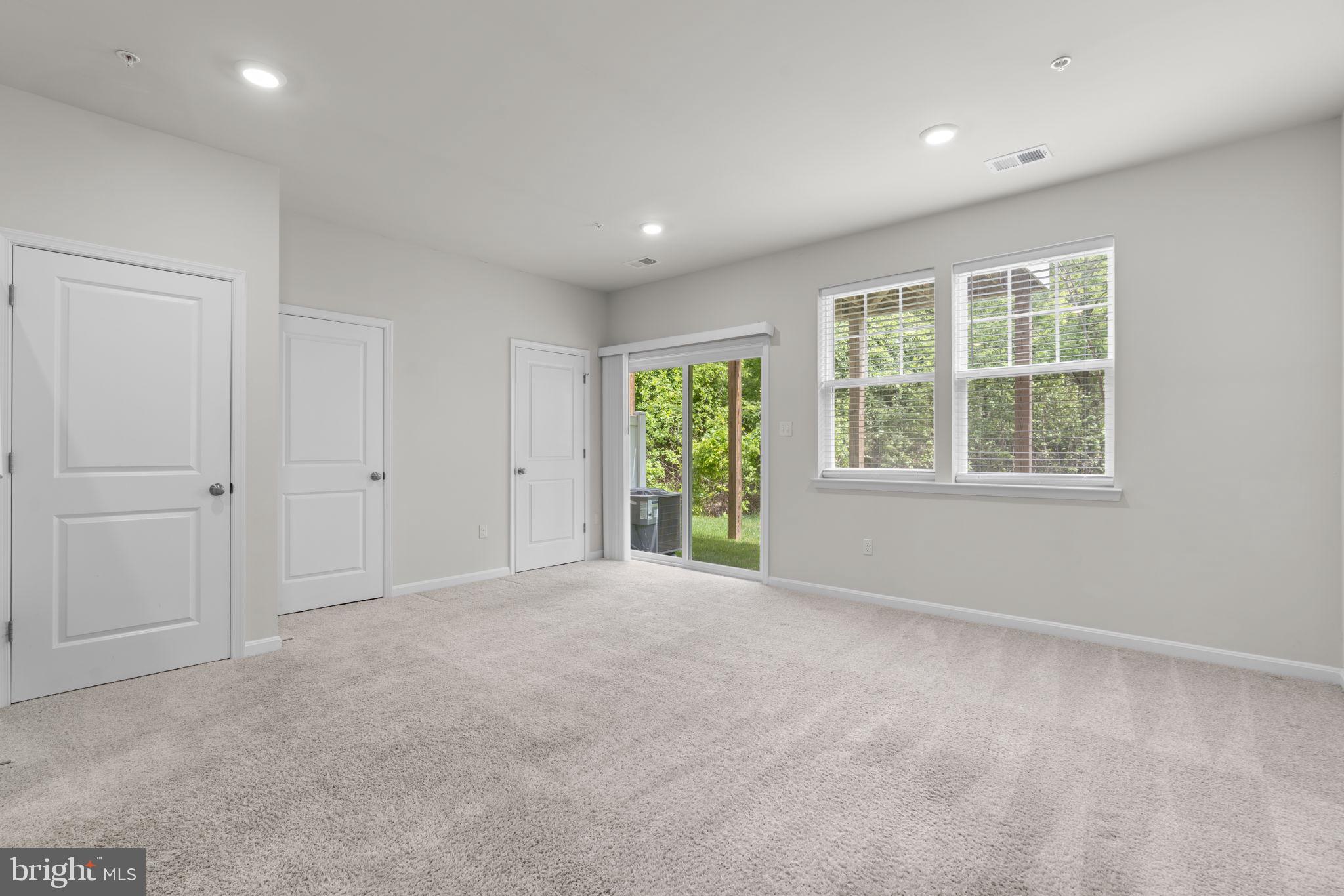 7980 Patterson Way Hanover, MD 21076 - Photo 34 of 45 Rec Room with Sliders to Backyard