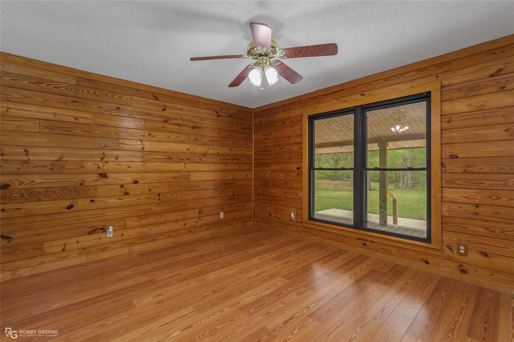 184 Hall Road Stonewall, LA 71078 - Photo 12 of 21 a view of an empty room and a window