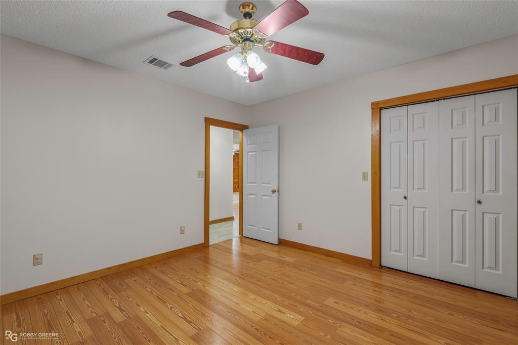 184 Hall Road Stonewall, LA 71078 - Photo 13 of 21 wooden floor in an empty room