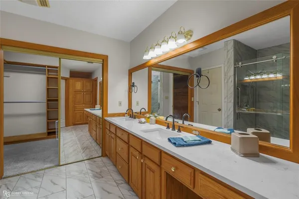 a view of house with wooden floor and fence