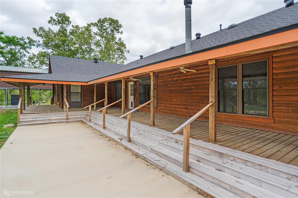 184 Hall Road Stonewall, LA 71078 - Photo 19 of 21 a view of house with wooden floor and fence