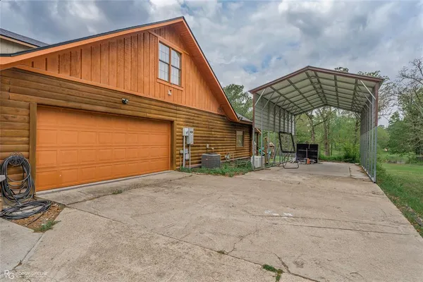 a view of a kitchen with furniture and a fireplace