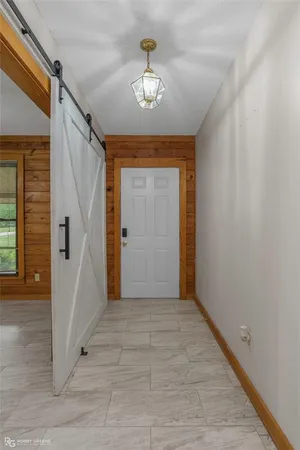 a kitchen with stainless steel appliances granite countertop wooden cabinets a sink and dishwasher